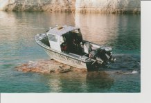 chase boat on the rocks 001.jpg